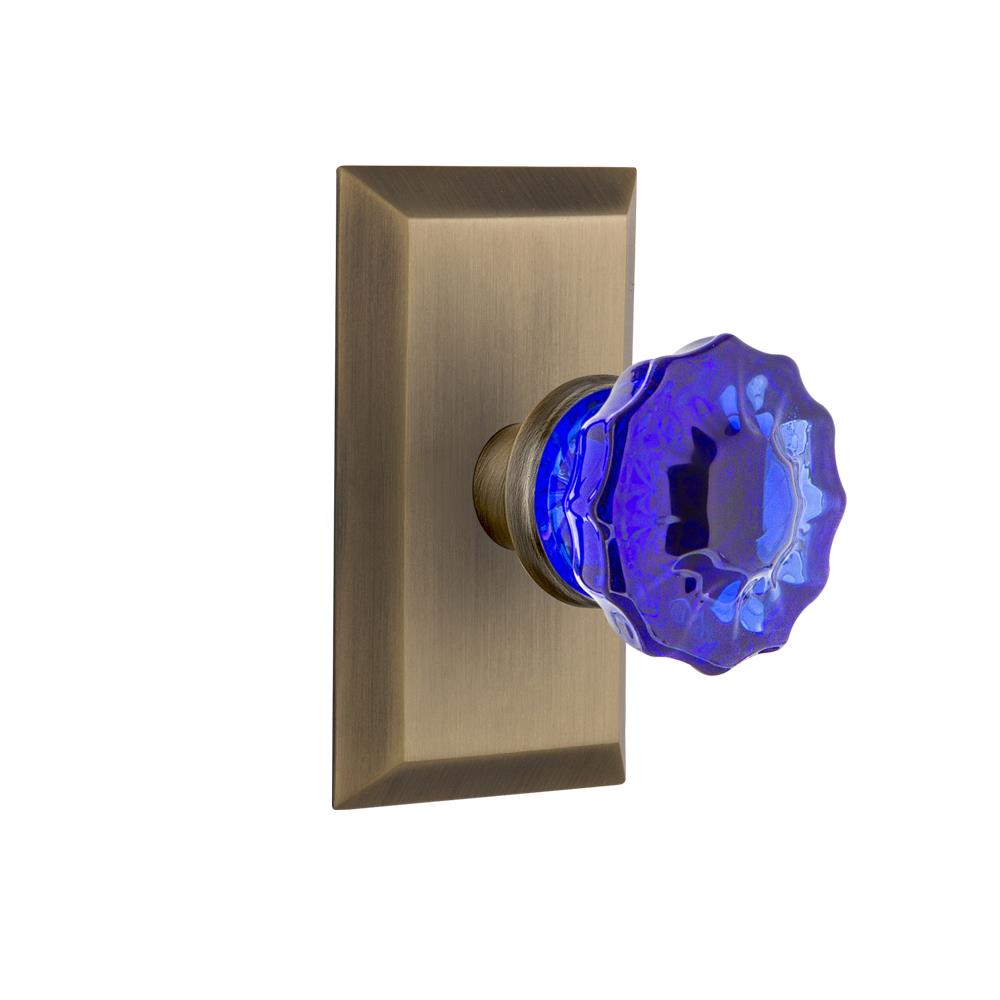 Nostalgic Warehouse STUCRC Colored Crystal Studio Plate Double Dummy Crystal Cobalt Glass Door Knob in Antique Brass